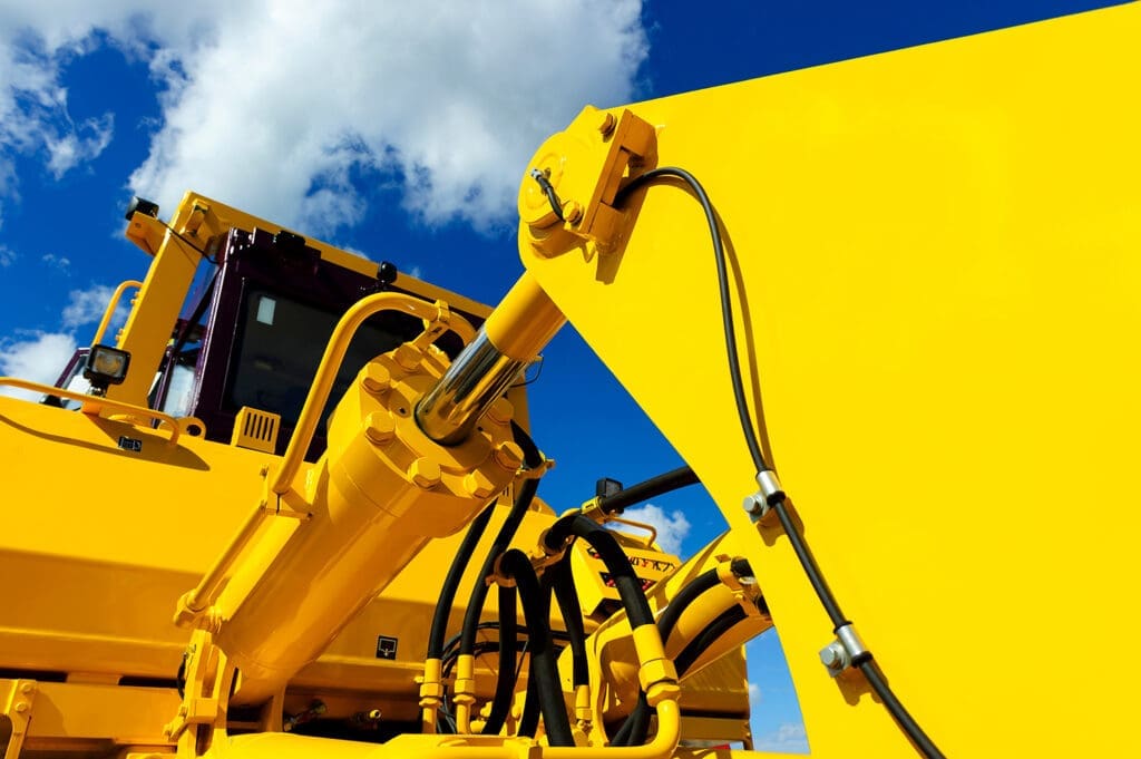 hydraulic piston arm on heavy construction equipment