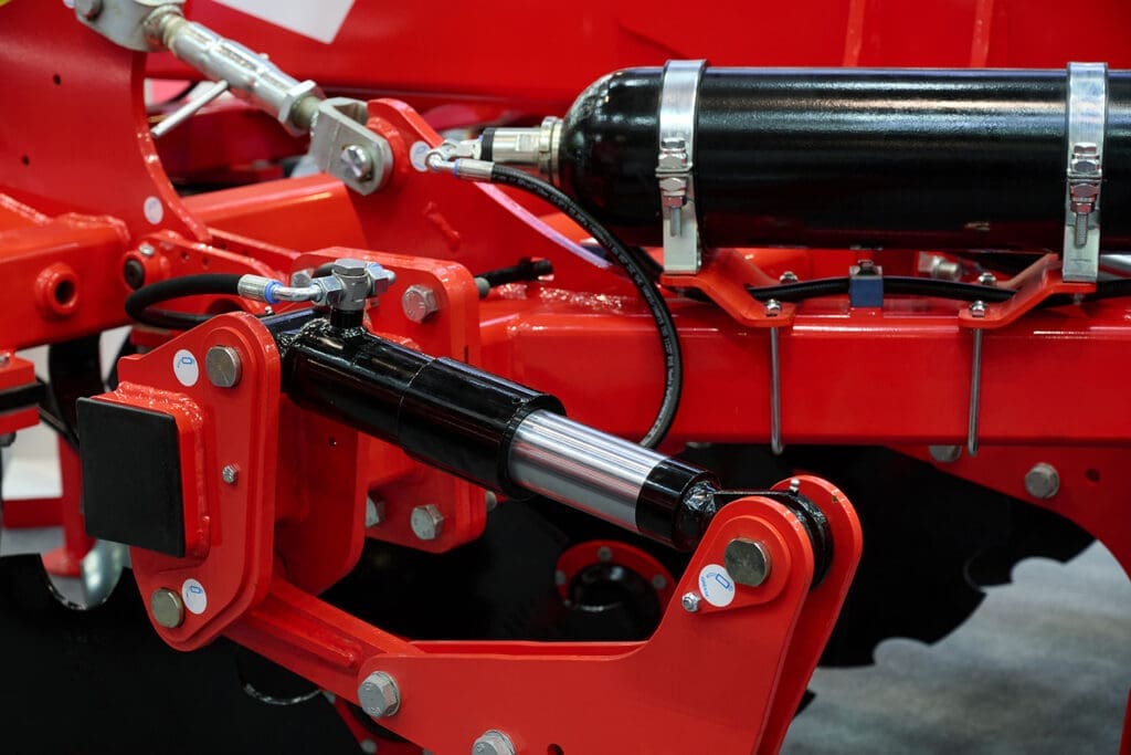 Hydraulic system control on agricultural plow